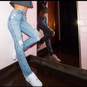 Revice denim high rise distressed raw edge jeans